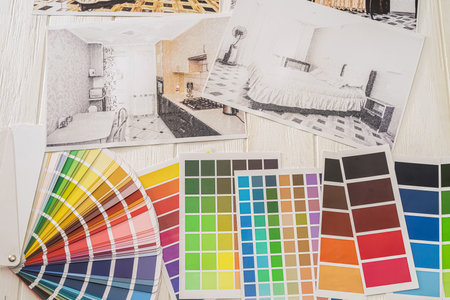 house building plan with palettes on color background, renovation concept