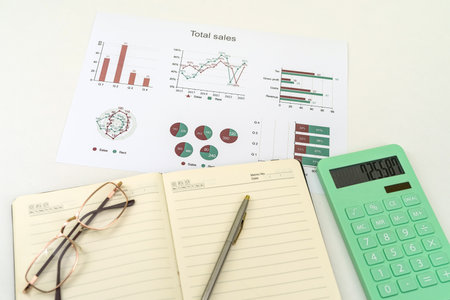 business working paper with a diagram calculator pen on desk. accounting concept