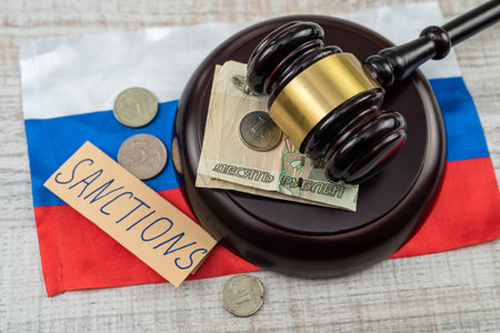 law wooden hammer with russian ruble sanction for country aggressor terrorist. defaultの写真素材