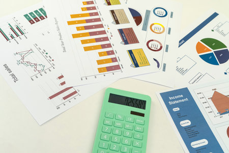 business working paper with a diagram calculator pen on desk. accounting concept