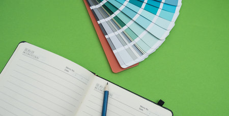 empty notepad with pen palette color isolated. all items for designの写真素材