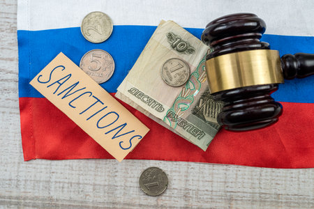 russia flag with money ruble and sanction all economic for country terorrist. defaultの写真素材
