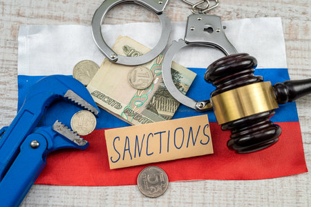 law wooden hammer with russian ruble sanction for country aggressor terrorist. defaultの写真素材