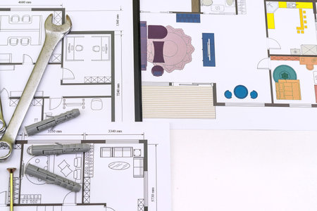 drawing house plan with drawing instruments. construction of real estate