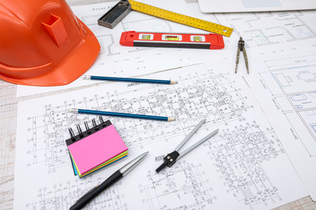 Architectural project construction of the house with helmet, compass, pencil, rural and calculator....