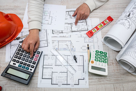 a man working on a drawing to create his home with professional design skills. design concept