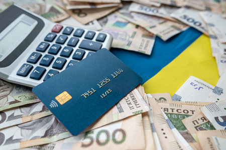 new 500 Ukrainian money hryvnia uah with calculator and credit card. financial concept. shopping or savingの写真素材