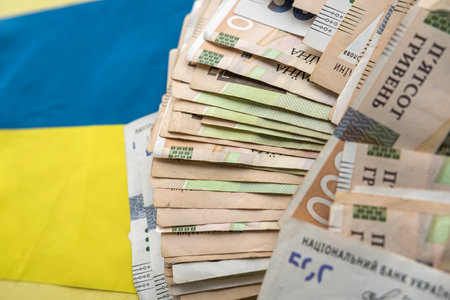 Ukraine national flag. Uah hrn gryvna hryvnia as business background, financial conceptの写真素材