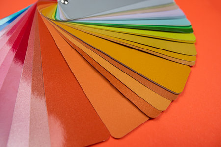 color models of samples for design new with wooden models on table isolated. Concept of design and...