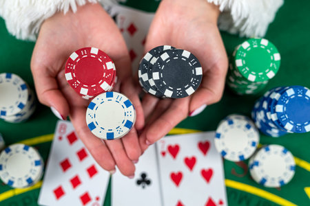 girl wins cards in the casino and takes the winnings and money dollars. blackjack poker. texas poker...