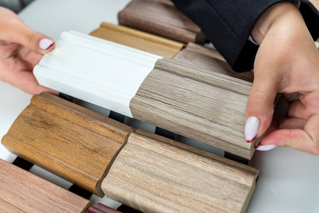 hands hold a wooden color guidebook. toned imageの写真素材