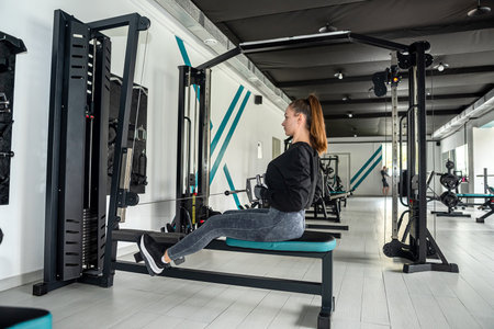 Photo of an active woman in sportswear doing sports. dynamic movement. side view. Sports and a...