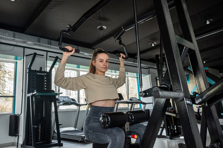 Young women do sports outside the house and train in the gym. sportswoman stretching. meditate in...