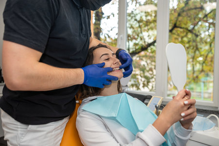 adult woman dentist at an appointment with her husband's. dentistry smile. teeth