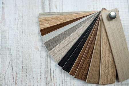 different sample of wood laminate board choosing for house project or design of modern apartments