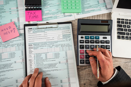 man work with tax form, time for tax, accounting concept. paperwork