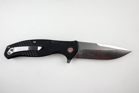 Tactical combat knife isolatred on white background. Sharp survival knife
