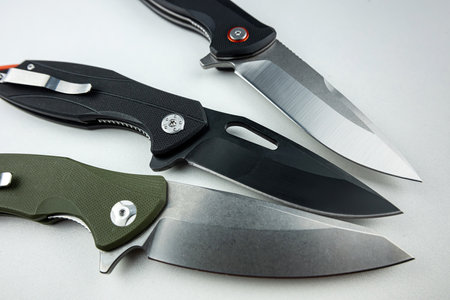 Three hunting knife or combat isolated on white. danger sharp tactical toolの写真素材