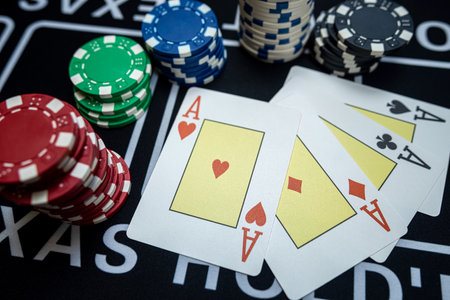 Four Ace playing cards with chips on casino table. Win success in gambling. Luck
