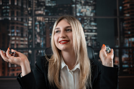 Woman player hold poker chips on the table with card in a casino. Jackpotの写真素材