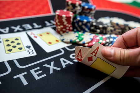 player is holding two ace cards - win combination at poker. Gambling conceptの写真素材