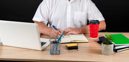 businessman working with business graph chart document with laptop and calculator at office....