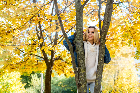 Portrait of beautiful girl in autumn park, spend and enjoy free time at nature. Lifestyle