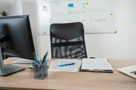 nobody, workplace with laptop, financial documents pen calculator at office interior. Stylish workplaceの写真素材