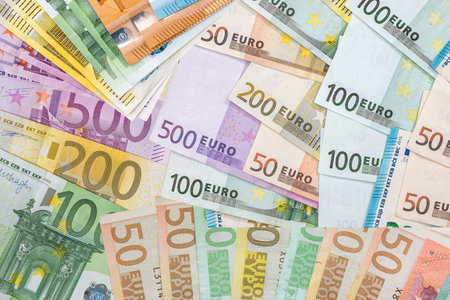 various denominations of EU Euro banknotes. Money concept