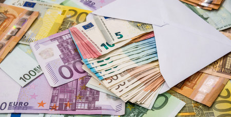EU Euro currency banknotes European paper money. Financial investment concept. Close up view.