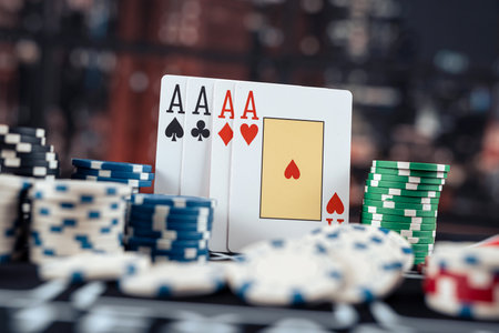 Poker playing four aces with stack of chips on the casino table. Gambling conceptの写真素材