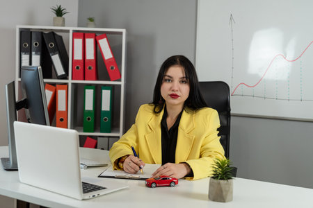 Female agent salesman prepare documents for buy insurance or lease car at office. Warranty or guaranteeの写真素材