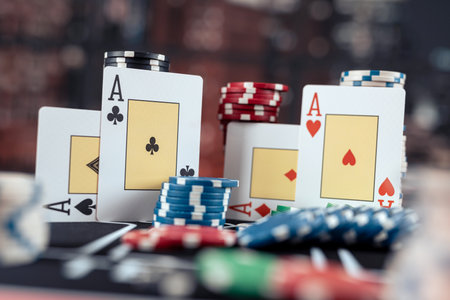 Poker playing four aces with stack of chips on the casino table. Gambling conceptの写真素材
