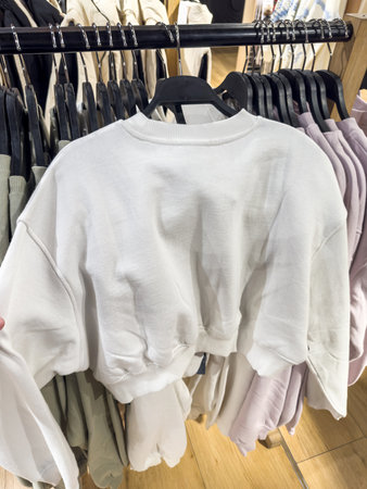 Women's shirt clothes new season lined up on the hanger. Women's clothing boutique.