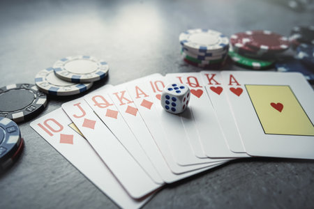chips for poker with playing card on grey background, nobody. Poker game conceptの写真素材
