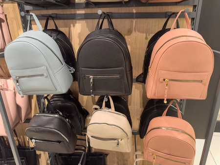 New luxury leather bags on the shelf on fashion retail store. Fashion conceptの写真素材