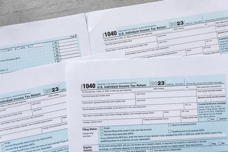 1040 blank tax form U.S. individual income return on desk. Deadline, tax seasonの写真素材