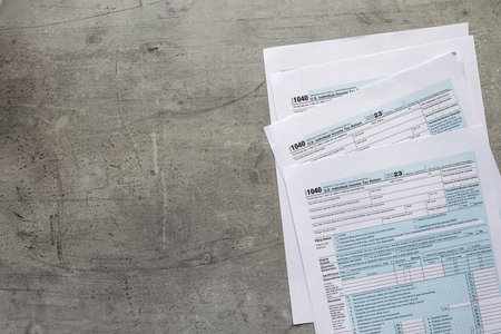 1040 blank tax form U.S. individual income return on desk. Deadline, tax seasonの写真素材