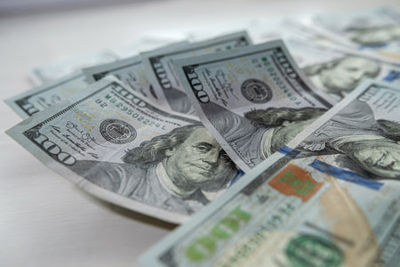 Pile of New USD Banknotes new 100 dollar bill finance background, investment conept