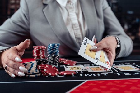 Playing woman poker and gambling in casino, spending time in games of chance. Gambling night lifestyleの写真素材