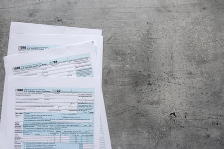 Close up of blank income tax forms 1040, deadlineの写真素材