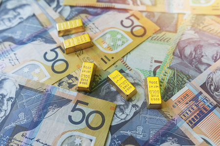 rich saving investment concept with gold bars and aud australian dollar. Money from Australiaの写真素材