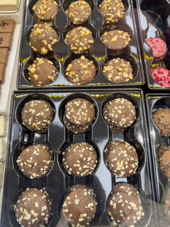 chocolate and candies in a box on a store shelf. Sweet candyの写真素材