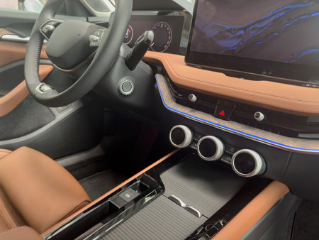 interior close up inside view of luxury car car driver seats, buttons dashboardの写真素材