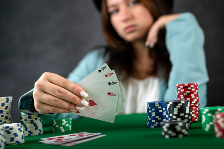 Beautiful poker girl starts a poker game with cards and chips on the table. poker game concept....