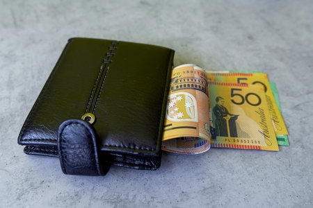 Australian Currency in a black male wallet. Financial saving concept. Aud