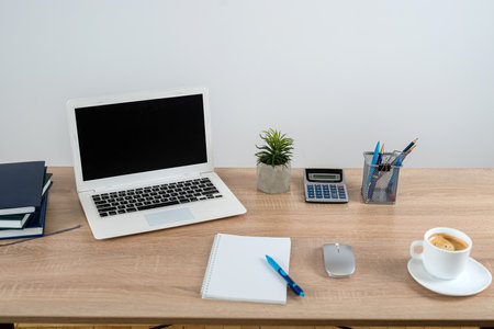Desk for study work or freelance with note pad pen and laptop. Online learn conceptの写真素材