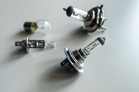 different car halogen headlight bulb H7 h1 h4 on white desk