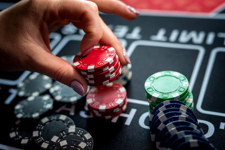 woamn play at casino and take chips for makes a bet. Entertainment conceptの写真素材