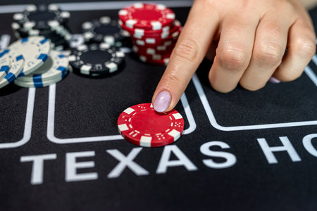 woamn play at casino and take chips for makes a bet. Entertainment conceptの写真素材